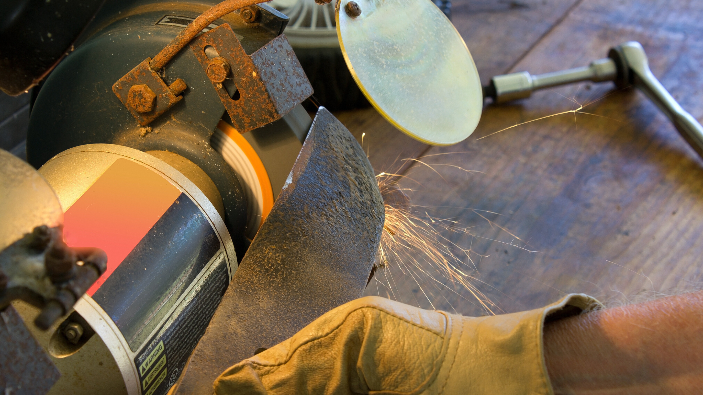 how to sharpen lawn mower blades with an angle grinder